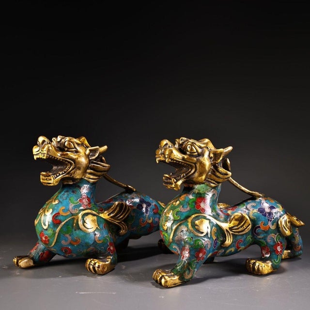 This is a matching pair of cloisonné enamel figurines in the form of guardian lions (Pixiu), featuring intricate high-...