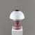 Table lamp made in Italy in the 1970s. Base in antique pink glass, upper diffuser in satin white glass and details in...