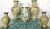 Offered is a Mid-Century Chinese cream cloisonne vase collection, 5 pieces with a matching cream ground. At rear is a pair...