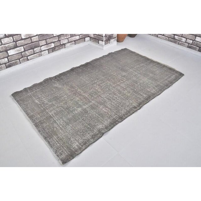 Vintage Distressed Overdyed Turkish Rug in Muted Charcoal Grey For Sale - Image 9 of 10