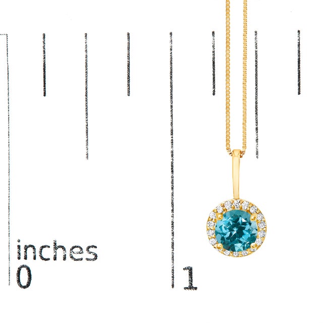 Early 21st Century 10K Yellow Gold Blue Topaz and 1/10 Cttw Diamond Accent Halo Pendant Necklace For Sale - Image 5 of 5