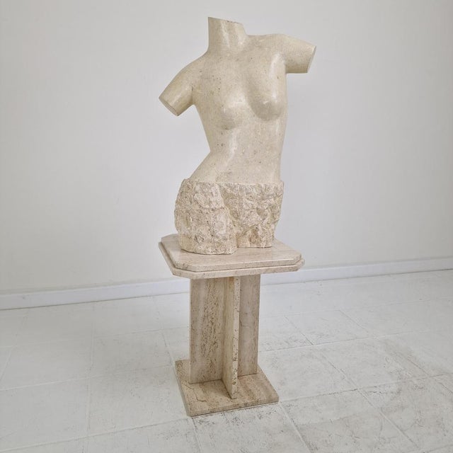 A refined contemporary female torso sculpture, meticulously crafted from hand-cut slices of reclaimed Mactan stone,...