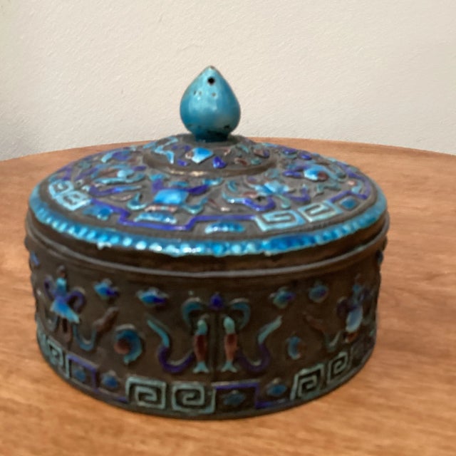 Antique Chinese Enameled Silvered Copper Box from China”. Antique Chinese circular box with repousse design , decorated...