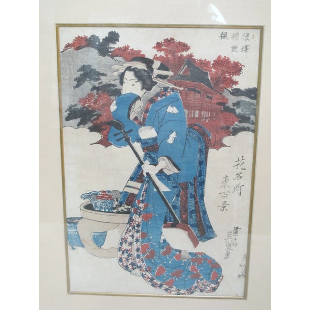 Kikugawa Eizan (1787 - 1867), antique wood block print, Bijin with Shamisen. The print depicts a woman with a shamisen (a...