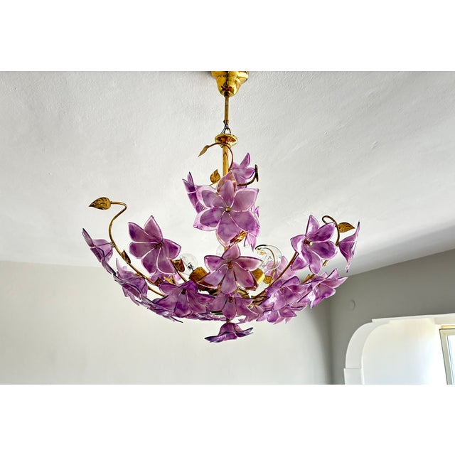 Step into a world of vintage romance and botanical elegance with this breathtaking 1980s vintage pink Murano glass...