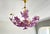 Step into a world of vintage romance and botanical elegance with this breathtaking 1980s vintage pink Murano glass...