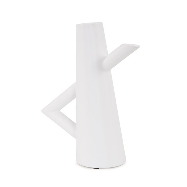 A beautiful collection of matte white ceramic vases were designed with a strong Scandinavian influence. The simple yet...