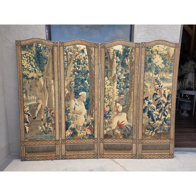 Beautiful antique tapestry screen made in the early 20th century out of 18th century tapestry fragments and antique french...