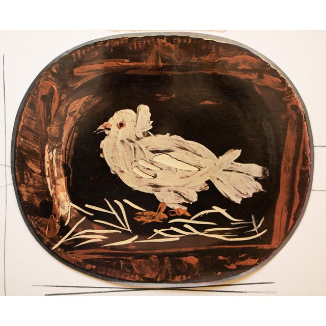 A stunning vintage period print of Pablo Picasso's ceramic Platter "Dove". Comes from an art folio published by Skira in...