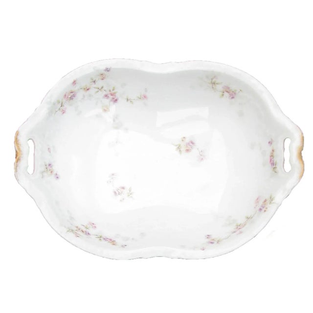 Collection of early 20th C. European porcelain serving pieces. The assortment includes a Theodore Haviland Limoges two-...