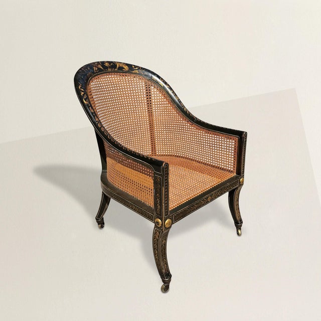 This 19th-century French Regency tub chair distills the language of its period with uncommon clarity and confidence. A...