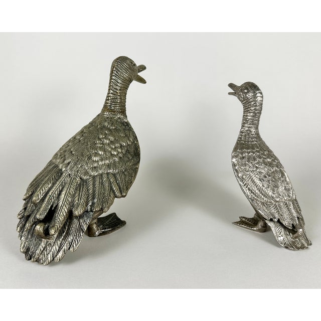 Delightful pair of vintage brass ducks, crafted in Belgium during the 1960s. Each duck stands proudly, capturing a sense...