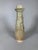 Pair of funerary urns with ovoid bodies and tall, cylindrical necks molded with a decoration of Taoist sages and coiled...
