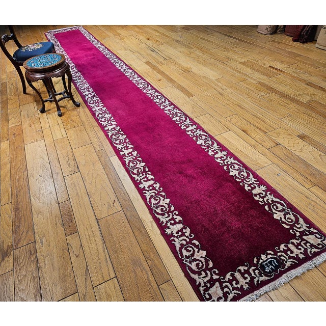 Simple, elegant, and truly captivating, this vintage Persian Tabriz long runner from the second quarter of the 20th...
