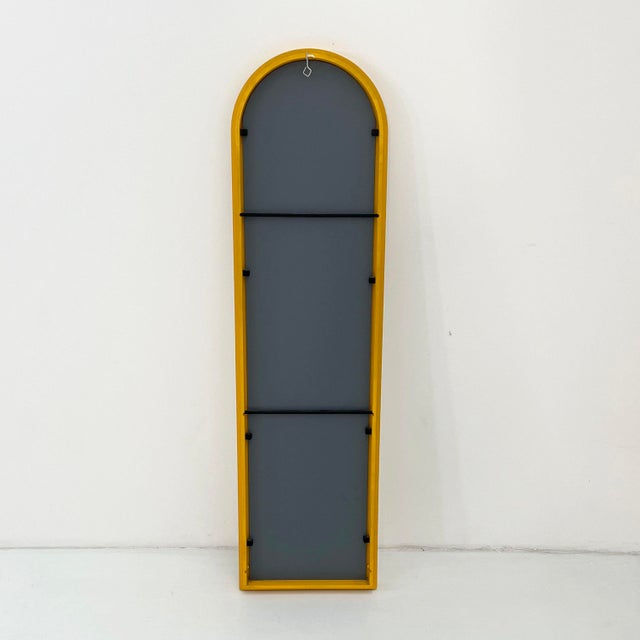 Yellow Frame Mirror by Anna Castelli Ferrieri for Kartell, 1980s, in Good conditions. Designed 1980 to 1989 This piece has...