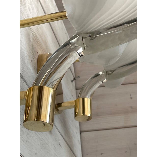Set of three vintage 1970s Murano glass leaf-shaped wall sconces with brass frames, attributed to Italian designer Franco...