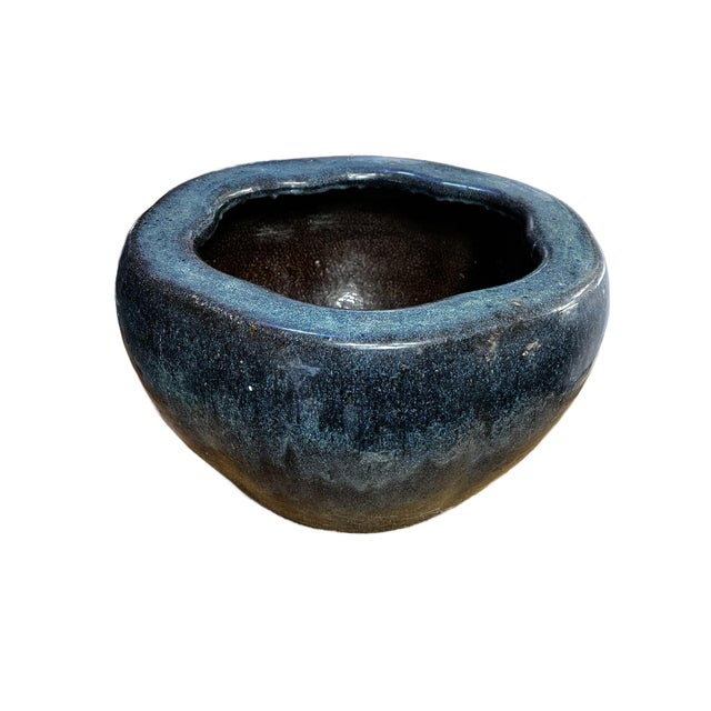 The pot is called a brazier. It was made in the first half of the 20th century and made in Yixing in China, and exported...