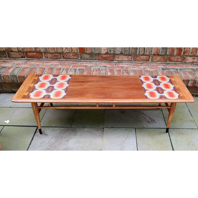 Set of three Lane Acclaim end tables to include a pair of tiered end tables and one coffee table.. All have been...