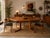 Beautiful 1970s Mid-Century Danish Modern dining table crafted in teak, featuring a warm natural finish and attractive...