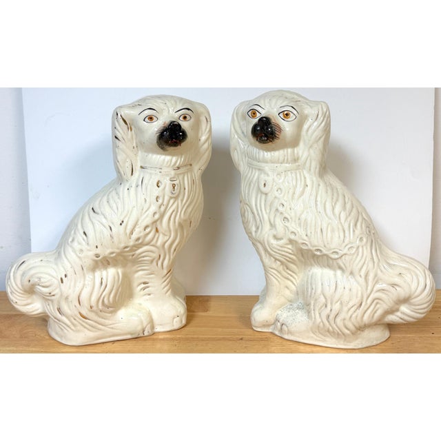 Large 19th-Century Staffordshire Pottery Spaniels, 14.75" High, Exceptional Scale & Expression A striking and unusually...