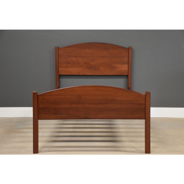 A solid cherry twin size bed in excellent condition. Clearance under the side rails is 11.75”. Footboard 24.25” high....