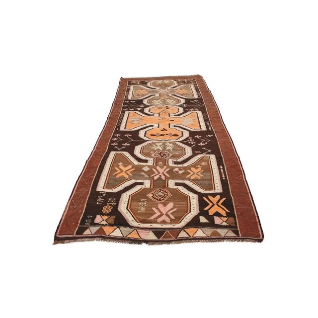 Vintage handwoven decorative kilim rug from Kars region of Turkey. Dated 1966. In very good condition.