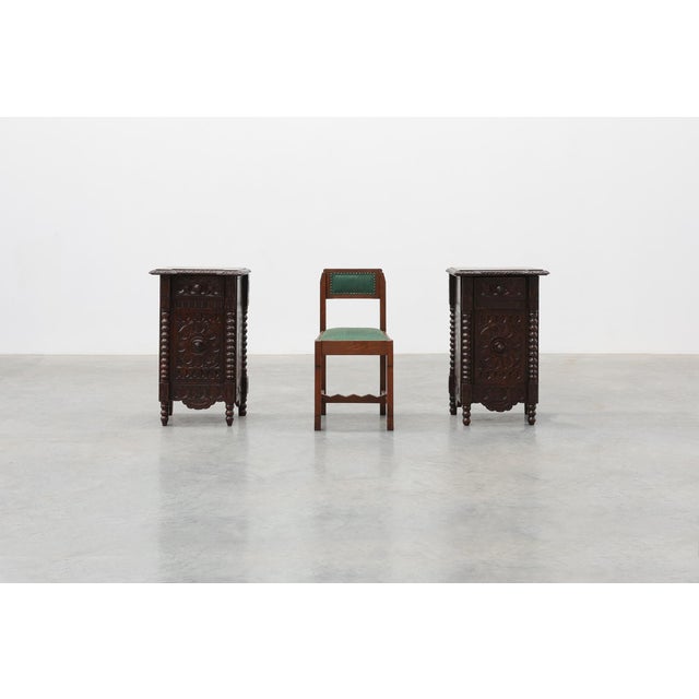 A charming pair of Breton bedside cabinets crafted in solid oak, dating to the early 20th century. Richly decorated with...