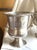 These ice buckets are most likely from the "The Ritz" hotel. Not sure if it is from the old luxury Ritz hotel in London.