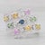 Gemstone Information: - Natural Sapphires - Total Carats - 2.20ctw Cut - Oval Brilliant Color - Yellow, Orange, Pink,...