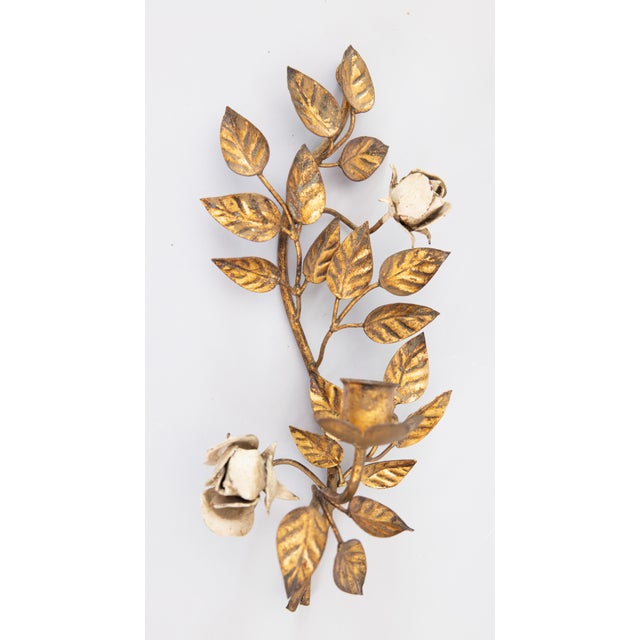 A gorgeous vintage Italian Florentine gilt tole candle sconce with lovely white roses and scrolling leaves, circa 1950. It...