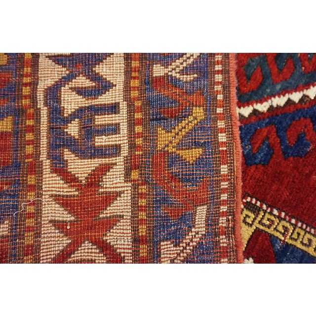 Striking Jewel-Toned Lori Pambak Kazak Rug on Red Background Color With Medallion Pattern For Sale - Image 9 of 9