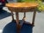 The Vintage French Empire Round Table is a stunning piece of furniture that exudes elegance and sophistication. This fully...