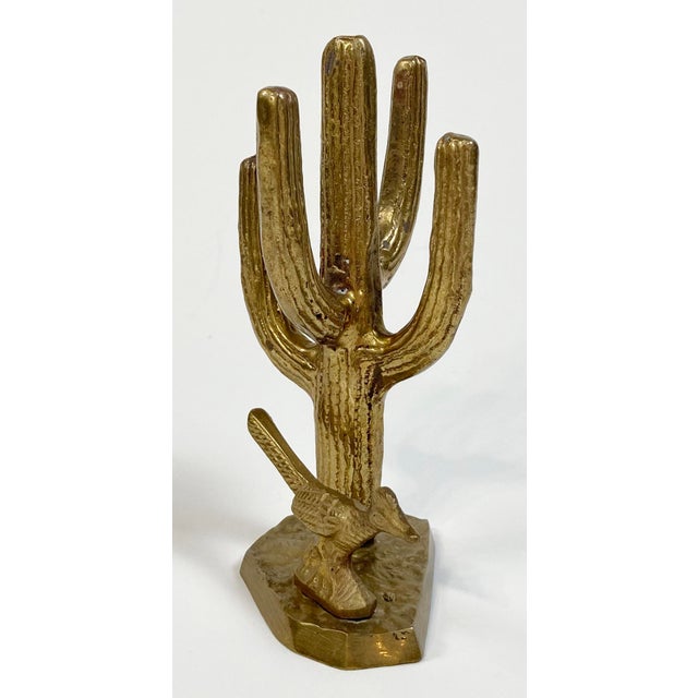 Vintage brass Saguaro cactus with road runner. Attached to solid brass base. Lovely patina.