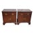 A matched pair of 1980s Baker Furniture Chippendale-style mahogany nightstands or bedside cabinets, crafted in the United...