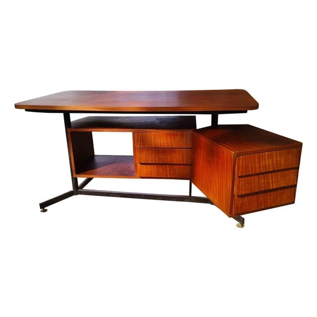 Wonderful t95 desk by osvaldo borsani for Tecno, Italy, about 1950. Equipped with two chests of drawers, one suspended and...
