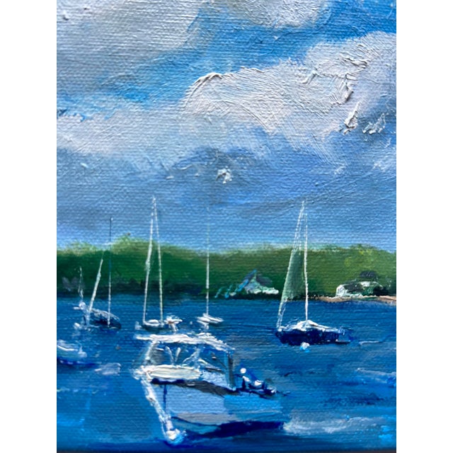 Boats moored in the harbor of a New England town. Inspiration for this painting was based on photos I took in the charming...