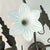Vintage 7 Light Wrought Iron Wall Sconce With Milk Glass Flowers & Cherub Motif - Matching Sconce Available Separately For Sale - Image 11 of 12