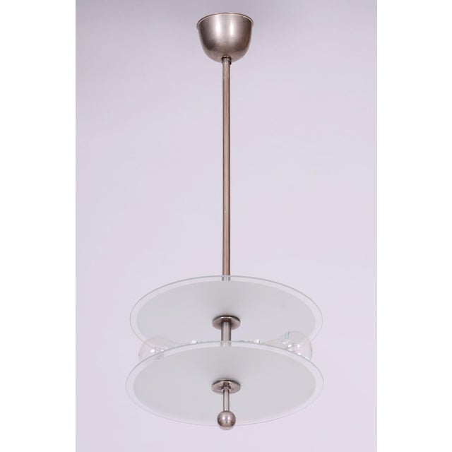 This chandelier is an exceptional and formally progressive representative of functionalism and the Bauhaus movement in...