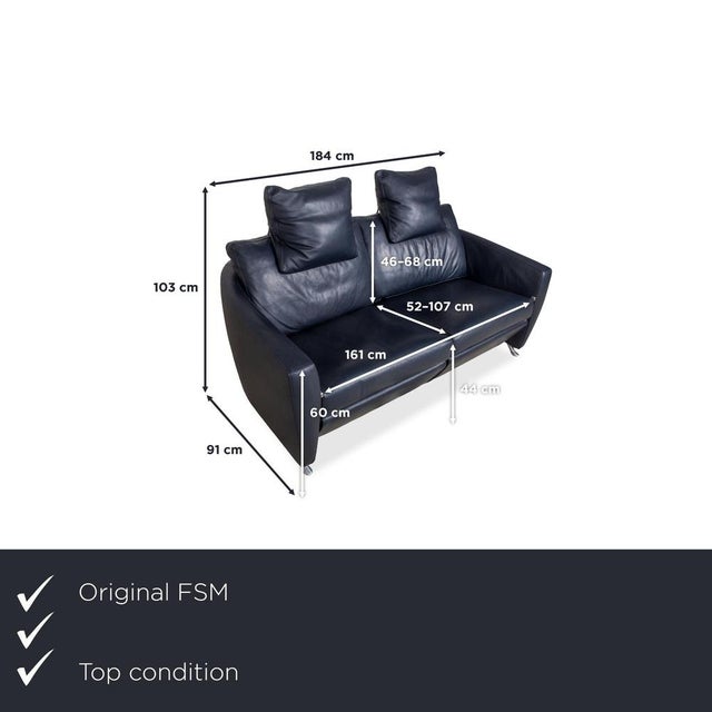 The FSM Sesam leather loveseat in dark blue combines modern design with exceptional comfort and high-quality...