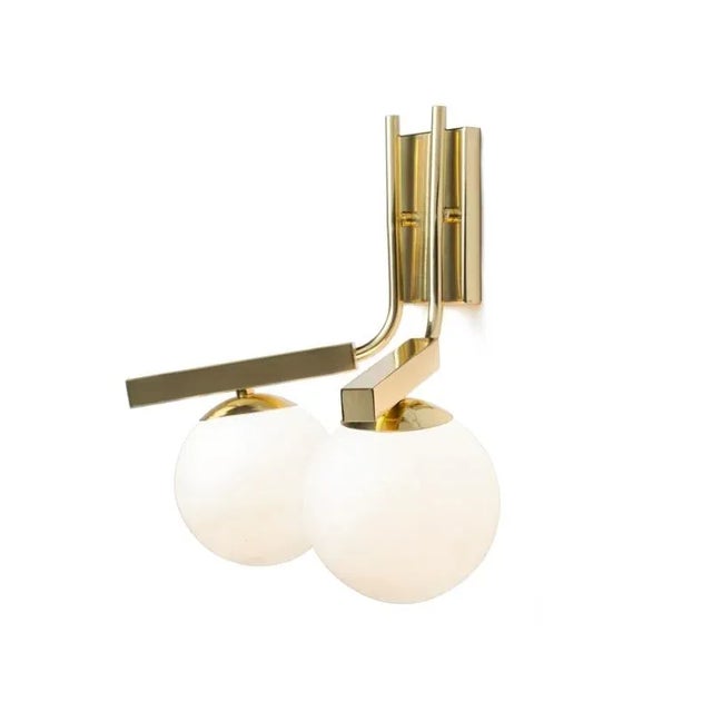 This Globe Wall I wall lamp comes in multiple configurations and finishes. It is available in lacquered, polished, or...