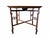 An elegant and highly collectible mid-century side table designed by renowned American designer Michael Taylor for Baker...