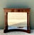 This magnificent Empire-style pier table is a masterwork of Neoclassical design, characterized by its architectural...