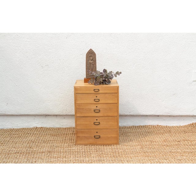 Discover the elegant simplicity of Japanese design with this charming antique Ko Tansu, a personal storage chest dating...