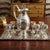 An elegant early 20th-century silverplate liqueur service by the respected American maker Homan Silver Company of...
