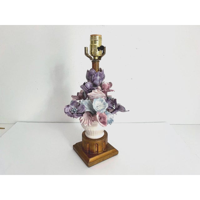 Lovely 1950s Italian Capodimonte porcelain bouquet lamp of handmade and applied soft blue, purple, and pink flower...