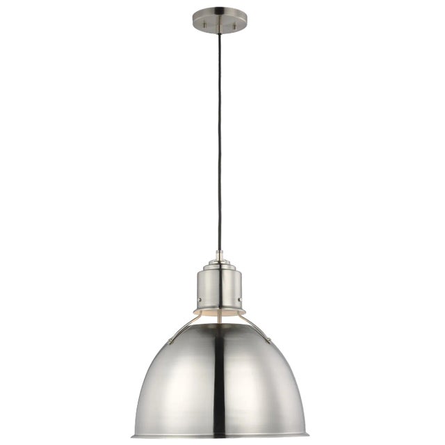 The Huey one-light pendant is offered in the Brushed Nickel, Antique White, Midnight Black, or Satin Bronze finish. The...