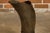An English hand-hammered brass and copper musketeer boot umbrella stand from circa 1920 with front buckle. Step into a...