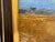 This is a late 20th century vintage impressionist landscape painting. This painting is presented in a dark brown and gold...