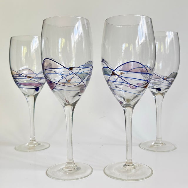 A vibrant and collectible set of vintage wine glasses from Artland’s sought-after “Helios” collection. These elegant...