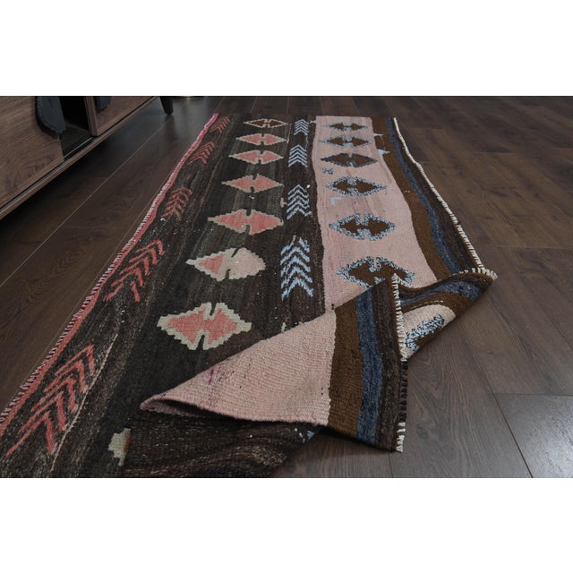 Vintage Turkish Hand-Knotted vintage rug is a semi-antique vintage area rug. The '70s Eastern region of Turkey's unique...